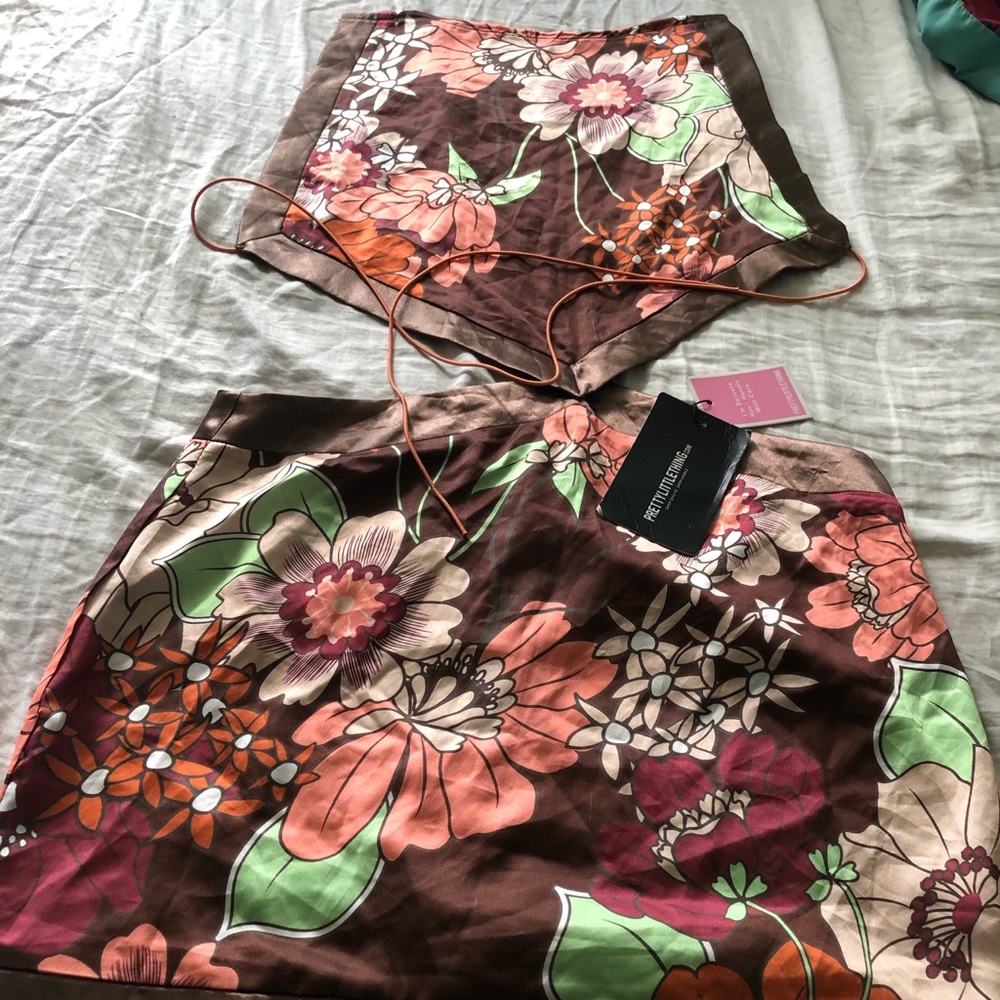 Pretty little thing dress. Earth tones with flowers.